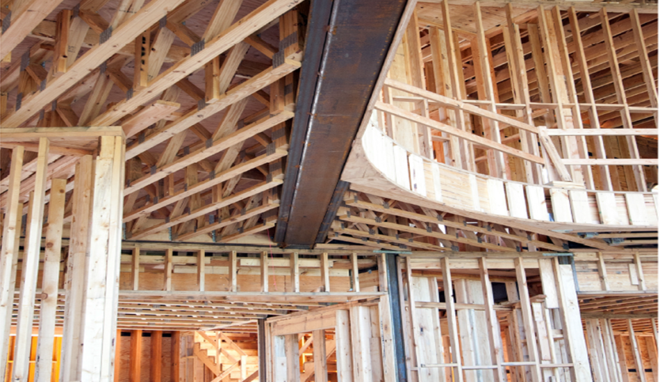 The interior of a house being built with wood framing.