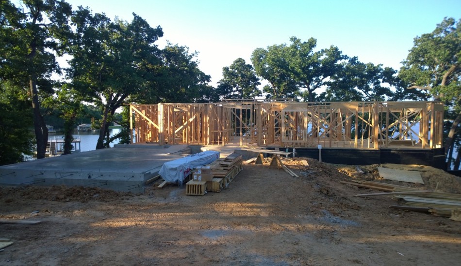 A house under construction with wood framing.