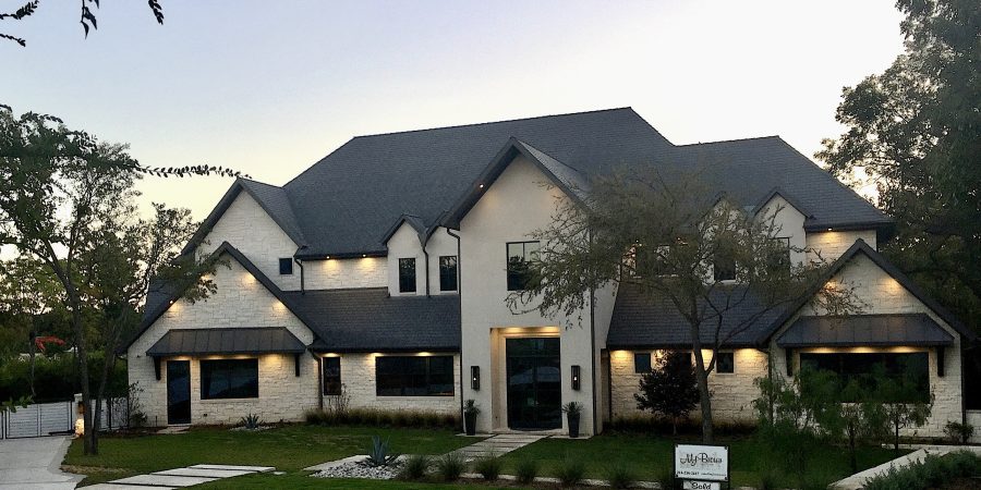 A beautiful house exterior with so many lights