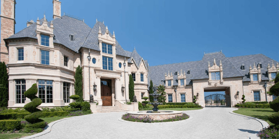 A White Color Mansion With White Pathway