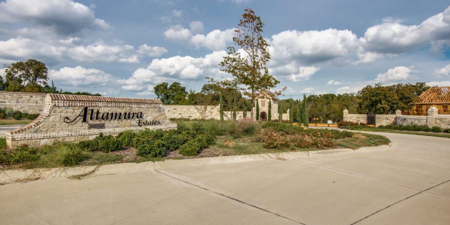 Altamura estates resort wall with its branding and path