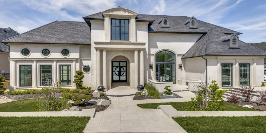 Elegant modern white home with entrance columns
