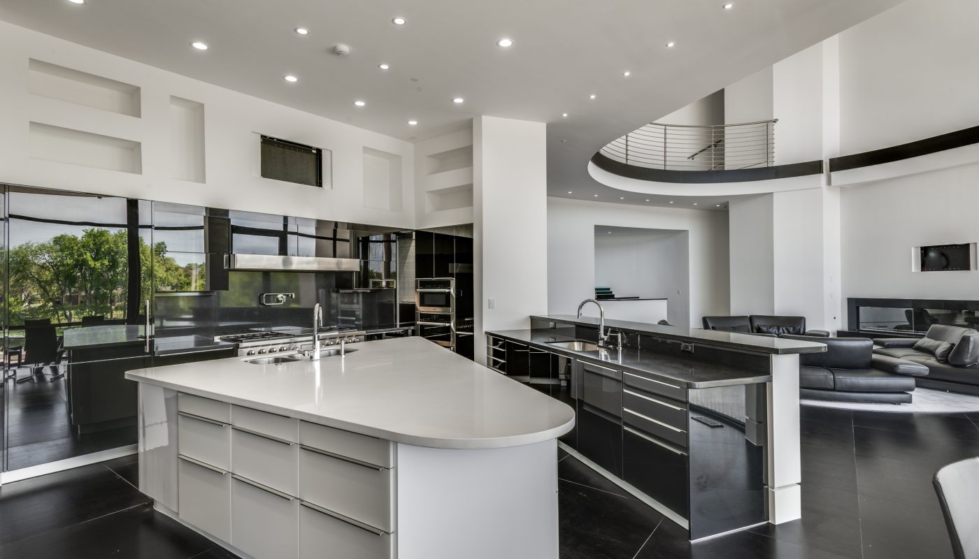 A premium kitchen in white color and premium finish