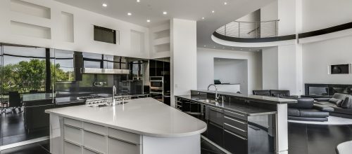 A premium kitchen in white color and premium finish